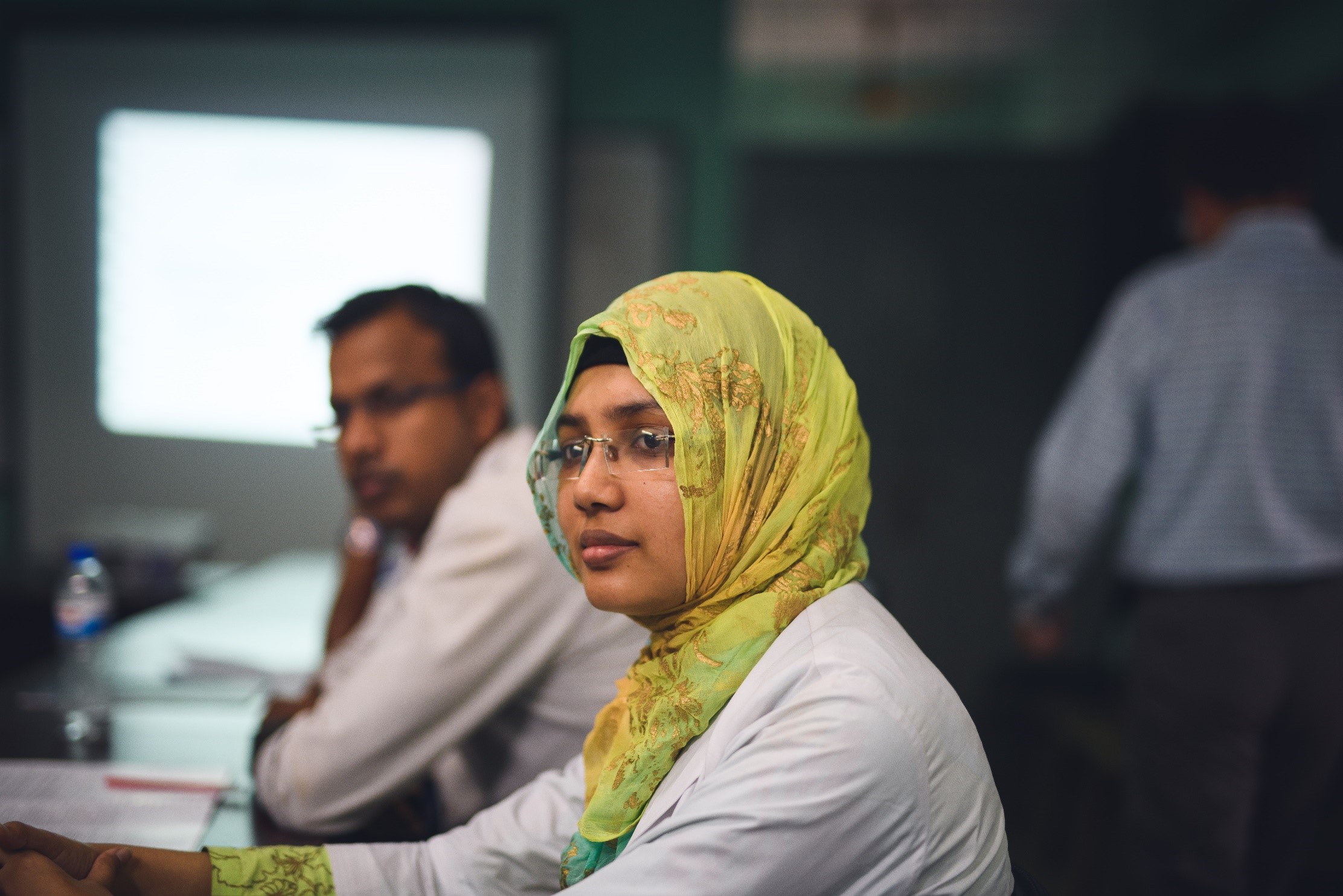 A woman in a room looking away