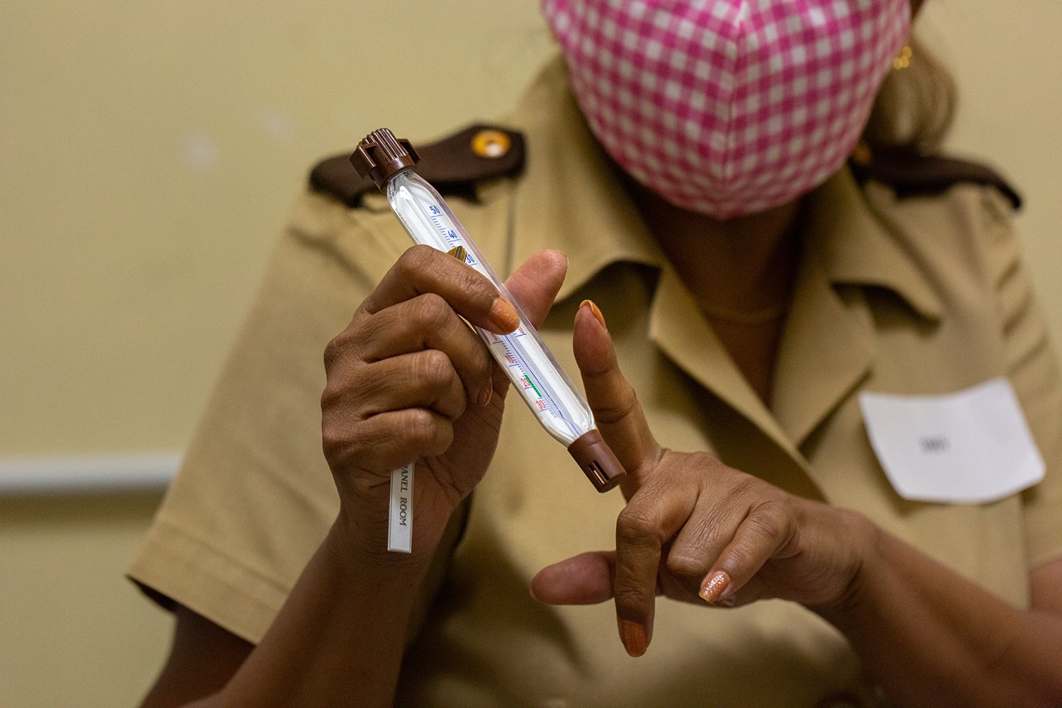 Waheeda Abdool Solomon, the senior district health visitor (DHV), gives a visual of required storage temperature for COVID-19 vaccines.