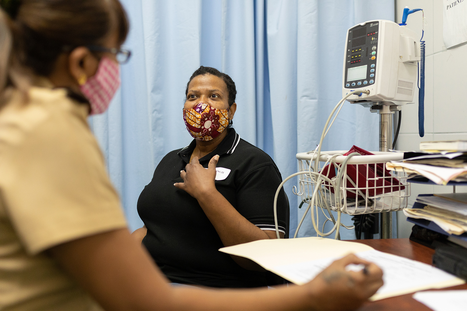 Janelle Alexander plays a COVID-19 vaccine recipient as part of a simulation exercise at the Siparia District Health Facility.