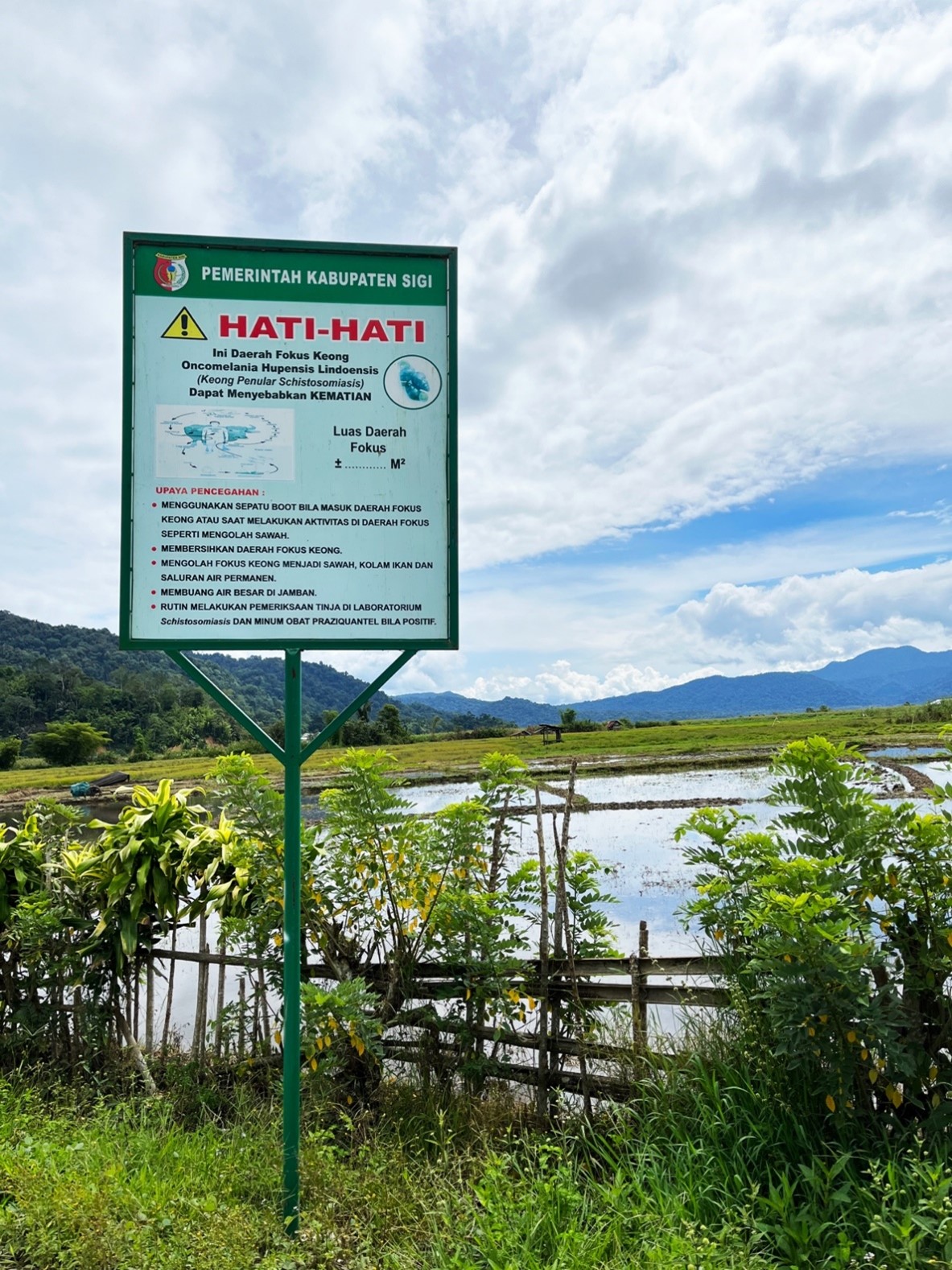 Warning sign near the foci area of schistosomiasis host snails.